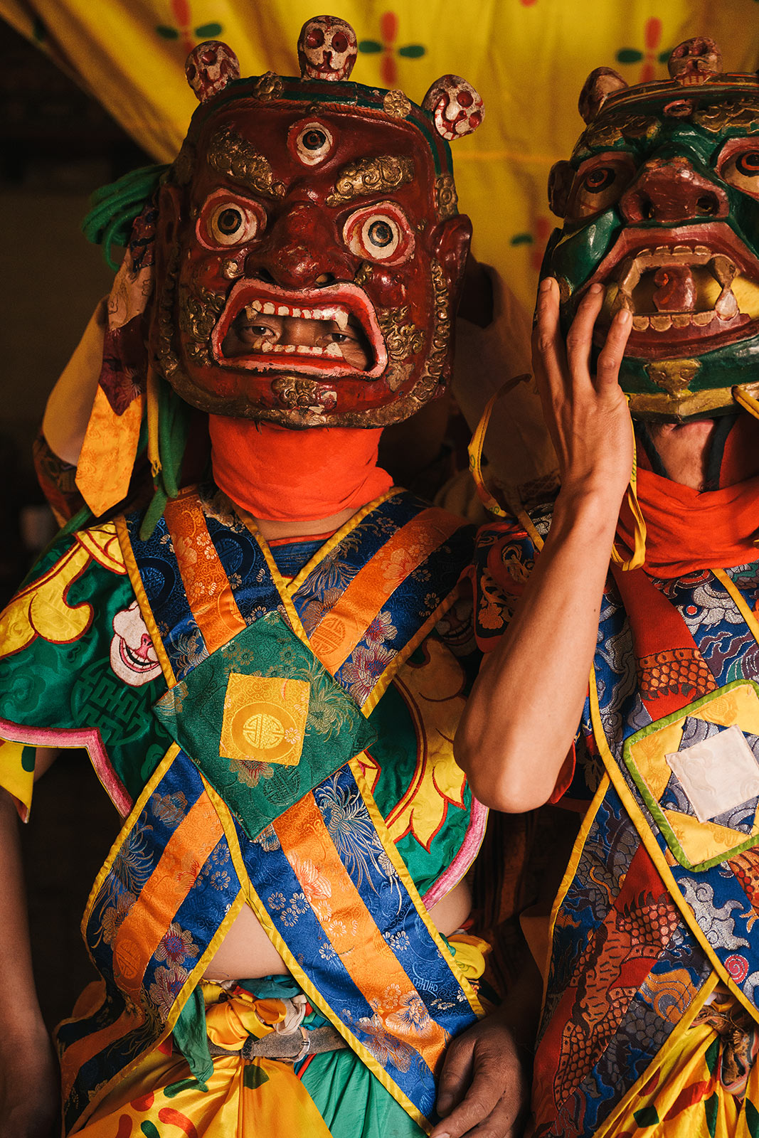 Traditional Bhutanese dress worn by locals during a temple gathering in Bumthang