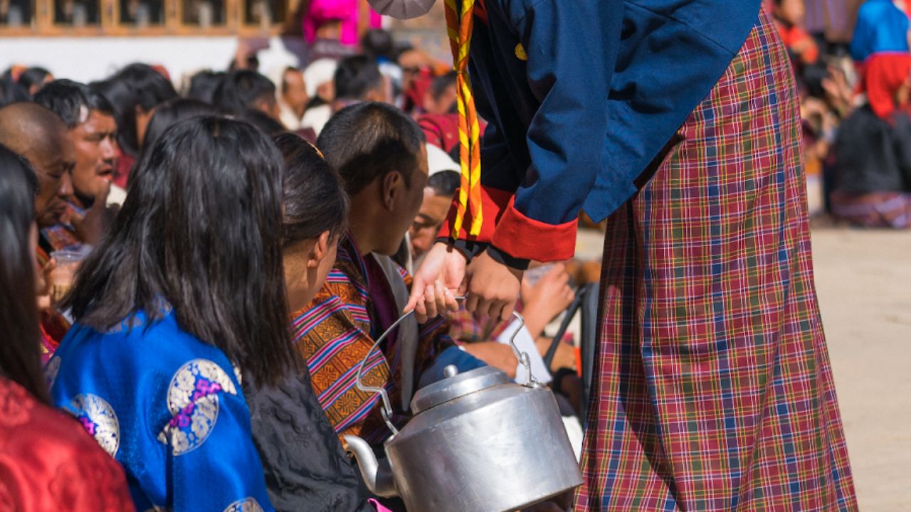 People gather to celebrate tradition and support community care during a cultural festival.